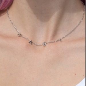 Brandy rainbow earrings and baby necklace